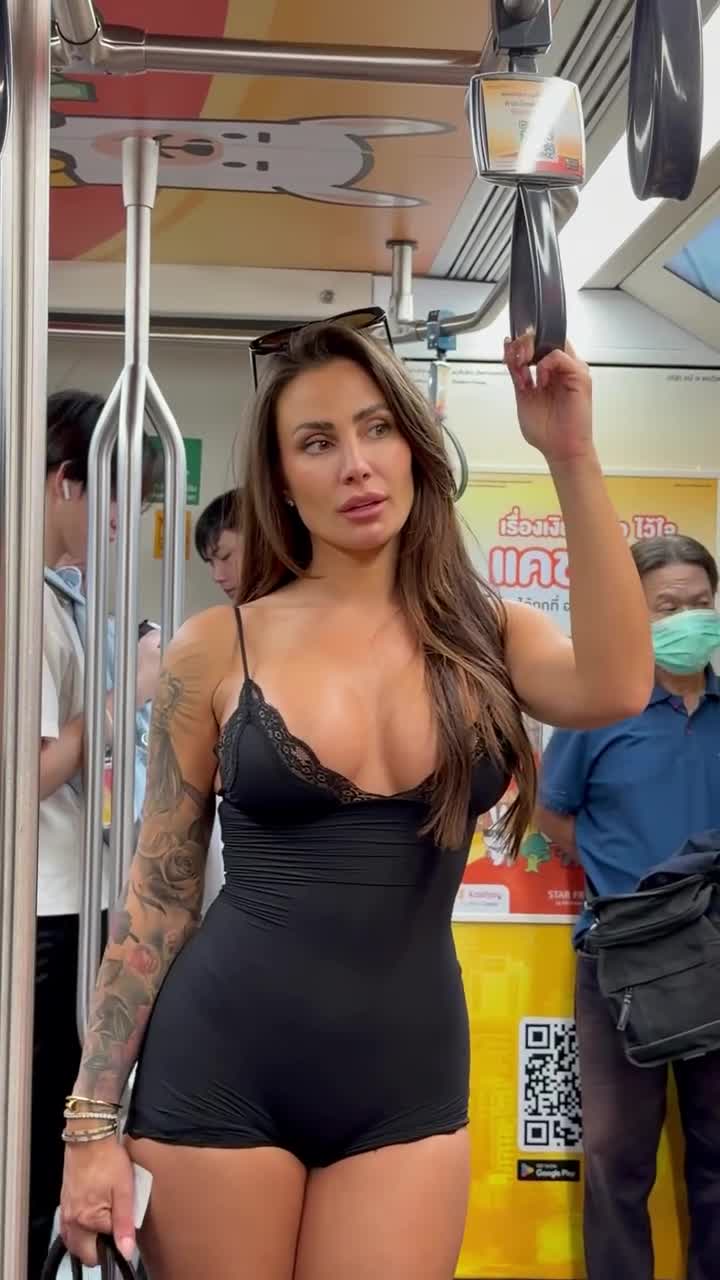 Violeta London — Black One-piece Swimsuit In Public Transportation thumbnail