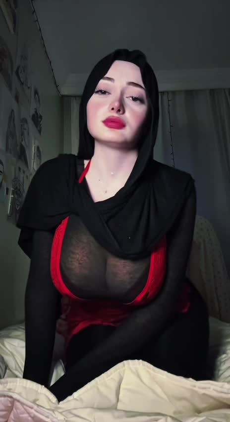 zelal / — Black Top With Red Accents In Bedroom thumbnail